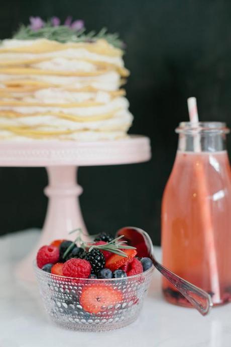 bowl of fresh fruit and blackberry lemonade 