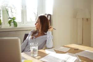 Woman working on Daily Inspiration Board