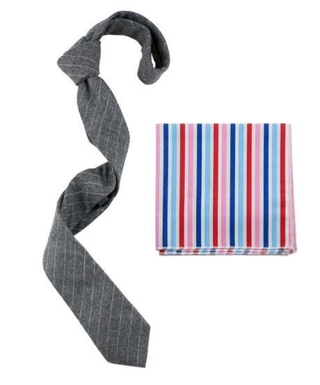 A neutral tie goes very well with a colorful pocket square. The pattern matching applies here as well.
