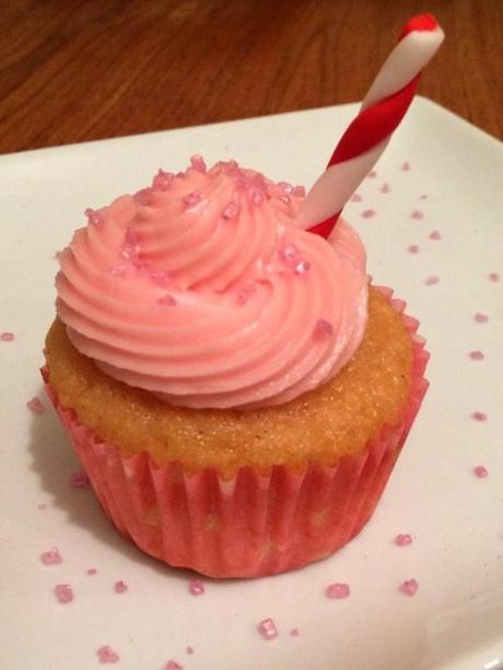 pink lemonade cupcakes sugar and crumbs flavoured icing sugar sugar sprinkles and straw