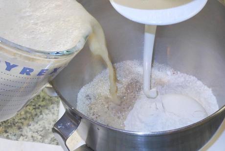 I poured my yeast mixture into a bowl containing the ground quinoa, ground flax seed, whole wheat flour, and 1 cup of flour.