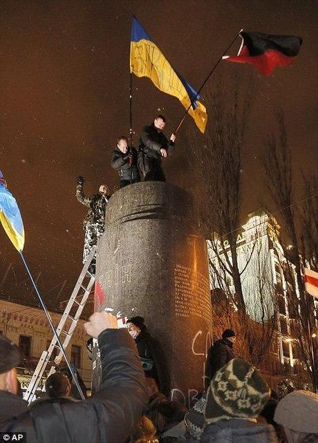 Lenin statue goes down, Nazi flag goes up, USA cheers. USA! USA! We're Number 1! We're Number 1!