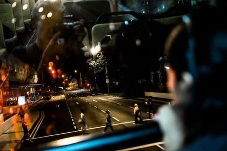 On the double decker bus at night