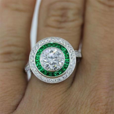 The Easiest Way to Buy an Engagement Ring Emerald and diamond halo engagement ring