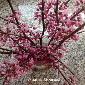 Harvested flowering branches from the felled redbud tree.