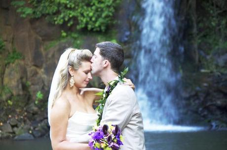 Getting married next to waterfall