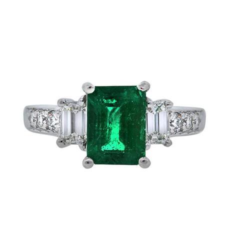 Emerald and diamond engagement ring