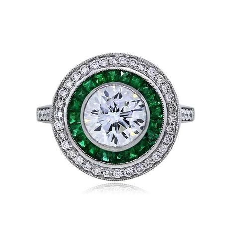 emerald and diamond halo engagement ring