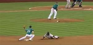 Don't wait for the infielder to go to the bag.  Spin and fake a throw!