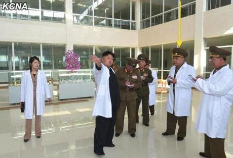 Ma Won Chun (annotated) takes notes during Kim Jong Un's tour of Taeso'ngsan Hospital (Photo: KCNA).