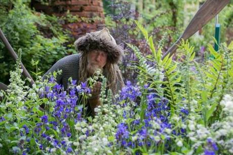 a viking taking a break at the chelsea flower show