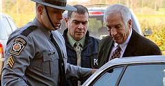 Jerry Sandusky, right, the former Penn State d...