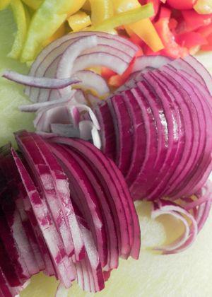 Warm Squid Salad - Slice onions