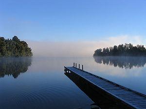 Morning mist on Lake Mapourika, New Zealand.