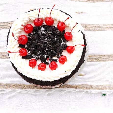 Oreo and Cherries on a Birthday Cake