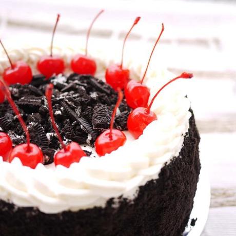 Oreo and Cherries on a Birthday Cake