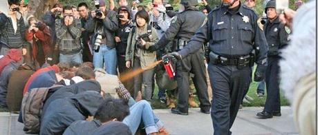 192897-us-davis-police-lt-john-pike-dousing-seated-students-with-pepper-spray-copy_thumb.jpg