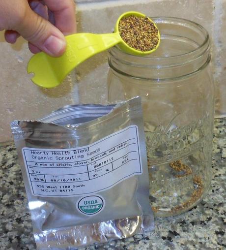 I measured 1 tablespoon of my sprouting mix, , and poured it into my clean jar.