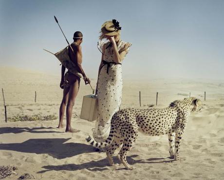 AGYNESS DEYN, SIMON & KIKI THE CHEETAH IN SAND STORM, KOLMANSKOP, NAMIBIA, AFRICA, 2011 BRITISH VOGUE