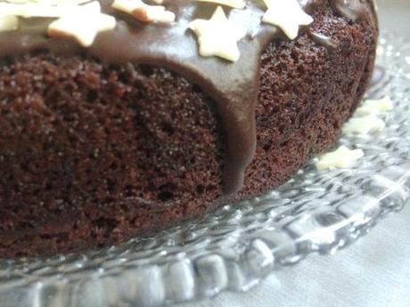 chocolate fudge icing ganache on gluten free olive oil birthday cake