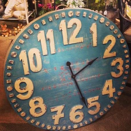 This is the clock I ended up buying for the porch. Fun, blue, a little girlie (but not too much), and it's deceiving in this photo. It is actually enormous.