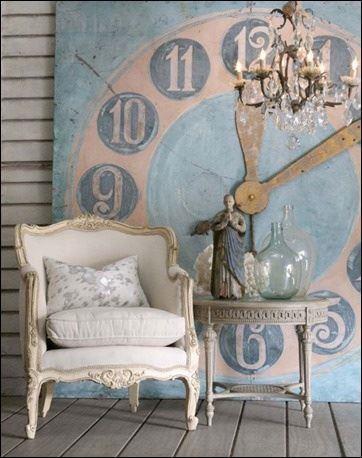 I saw this GORGEOUS photo on Pinterest and pinned it immediately. I loved the idea of a REALLY BIG clock. And while our porch won't be quite this 