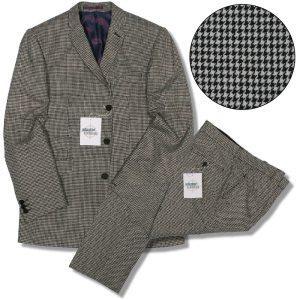 The Literary James Bond A black and white houndstooth suit offered by Adaptor Clothing of the UK, very similar to something Bond would have worn.