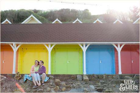 colourful couple have a fun engagement photography session at North Bay Beach in Scarborough