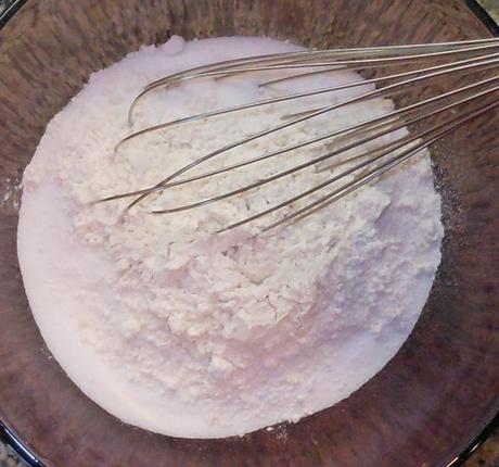 Next, using a whisk, I mixed together 1 1/2 cups of sugar and 1/4 cup of flour.  