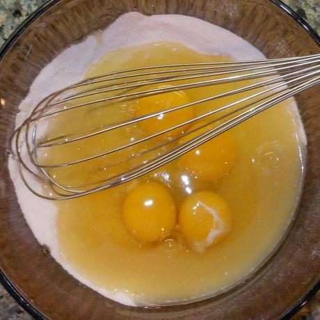 Then I added the eggs, lemon juice, and lemon zest and, using the whisk, I mixed until everything was well incorporated...