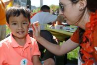 Thousands Flock to the Friends 2014 Duckling Day Event