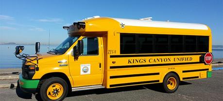 Electric school buses that feed the power grid could save school districts millions