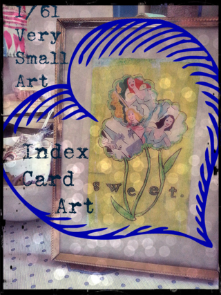 Very very small art combines my love for mixed media, creative challenges and vintage books. Can anyone say 