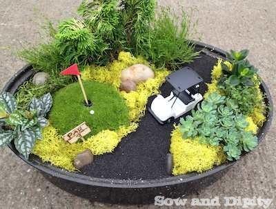 Mini garden golf green in a roasting pan
