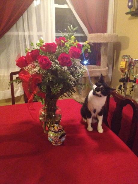 I realize the urn-like piece next to the flowers looks like an urn, but it's actually just our normal centerpiece. No one's ashes are in there.