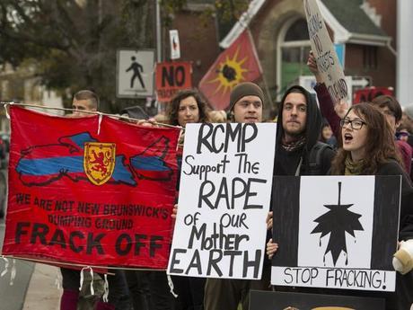 Demonstrators rally against shale gas exploration on Friday, Oct.18, 2013, in Halifax. The effort was in support of protesters, some of whom included members of the Elsipogtog First Nation, who rallied against SWN Resources and its possible plans to proceed with shale gas development in eastern New Brunswick. Photo: THE CANADIAN PRESS / Andrew Vaughan