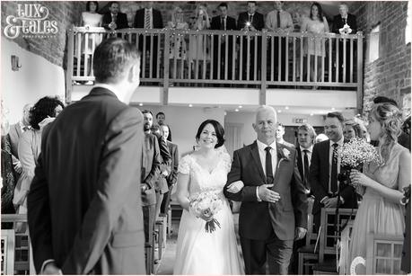 Bride walks up the aisle at the Ashes