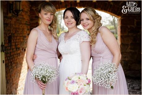 Bride with bridesmaids at the ashes wedding
