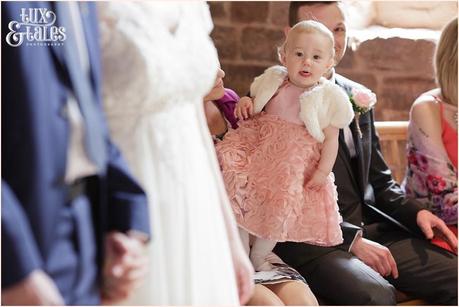 Bride and groom's daughter watches on during the ceremony at The Ashes