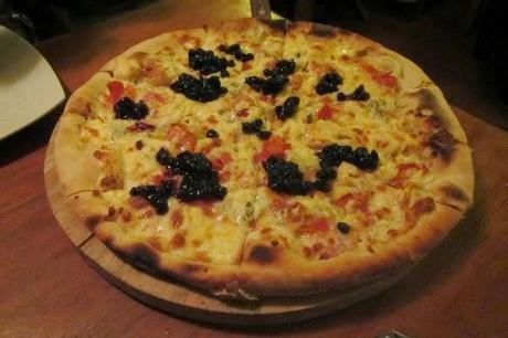 Goat Cheese and Elderberries on a Pizza?  It is delicious!  From La Bodega 138