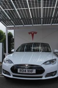 White Model S under the Solar Canopy