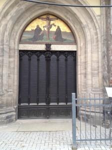 The door that held Luther's 95 theses was destroyed by fire. This bronze door replaced it and has all 95 theses etched into the metal.