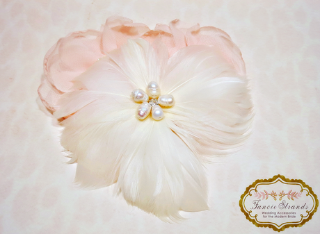 <ivory and pearl feather fascinator by FancieStrands on Etsy alt=
