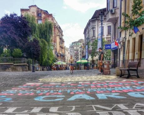 Street art along one of the pedestrian streets lined with restaurants and cafes.