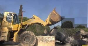 Bulldozer destroying the Al-Rashid lions in Syria.