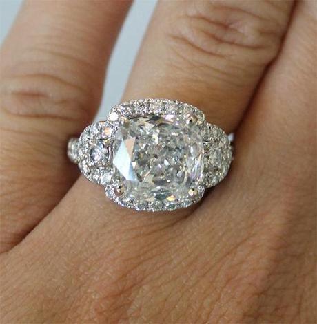 Halo cushion cut diamond engagement ring