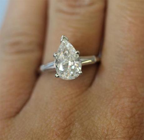 Pear shaped engagement ring with baguettes