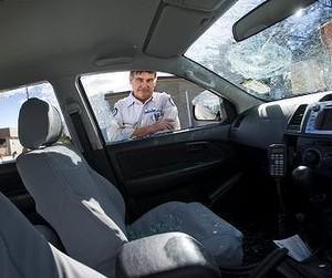 Sabotage and Vandalism Strikes Orchestrators of Kangaroo Cull Area manager of urban reserve at Parks and Conservation Peter Galvin inspects a brand new Toyota Hilux whose windows were smashed and the tyres slashed. Photo: Elesa Kurtz