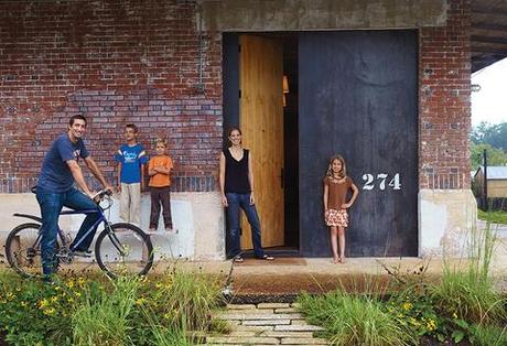 Architect David Hill in his renovated brick home in Auburn Alabama with his family. 