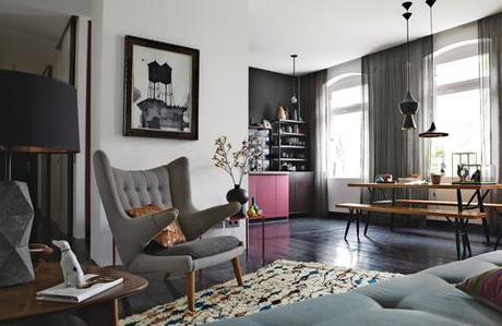 Berlin open plan apartment with reclining chair and dining table and kitchenette